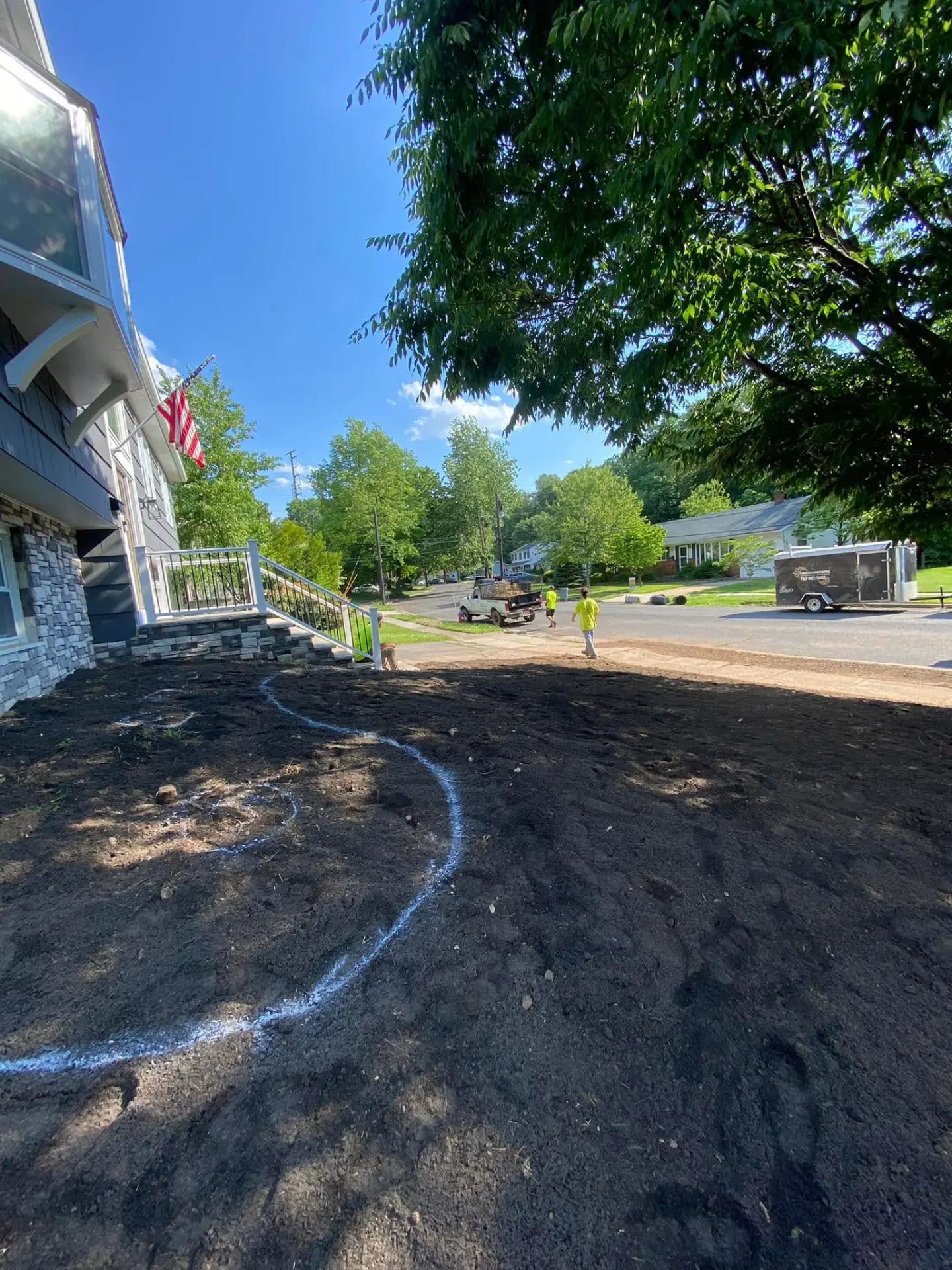 Graded front yard marked out for a new landscape bed layout