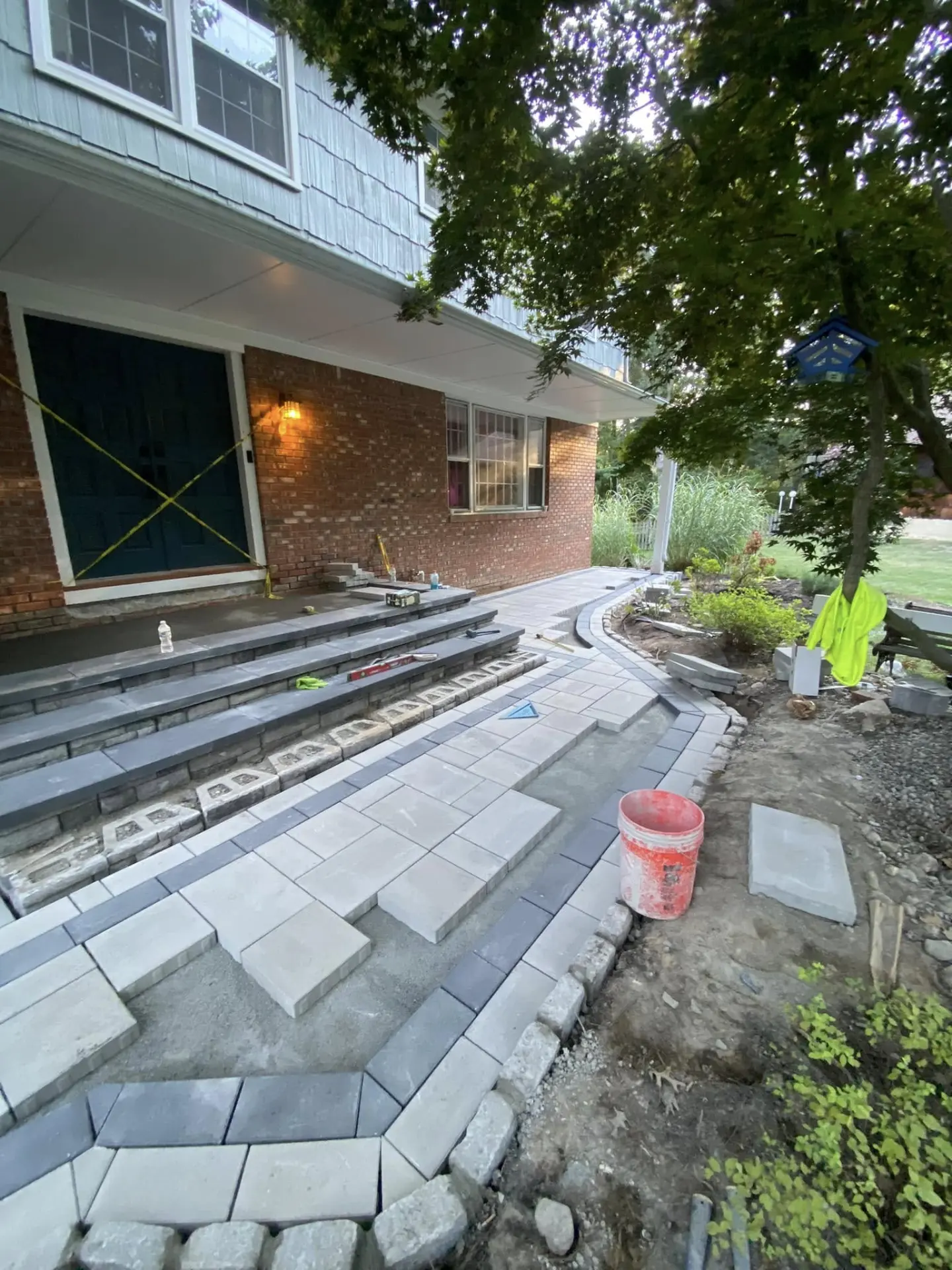 Bluestone front steps and paver walkway installed by Fiorenza Landscaping